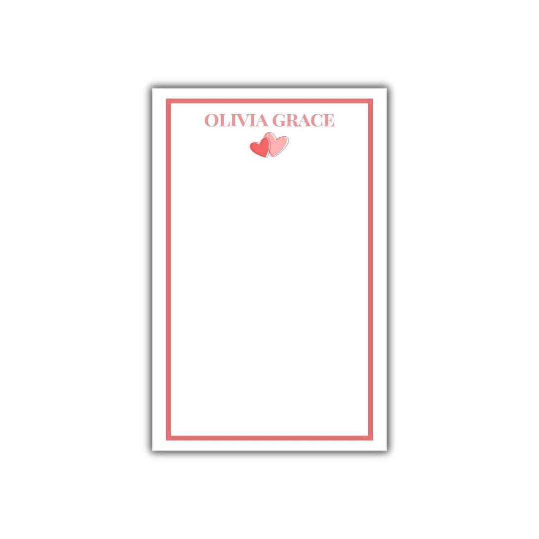 Personalized Valentine's Day Notepad with red border, pink text, and cute heart graphic in red and pink.