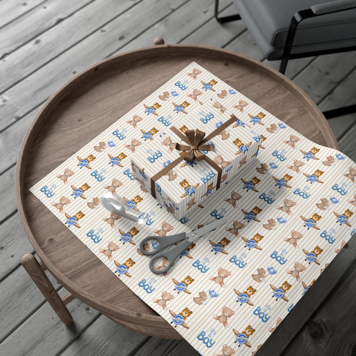 Beige striped wrapping paper with Its a boy text and graphics of little brown bears with blue balloons