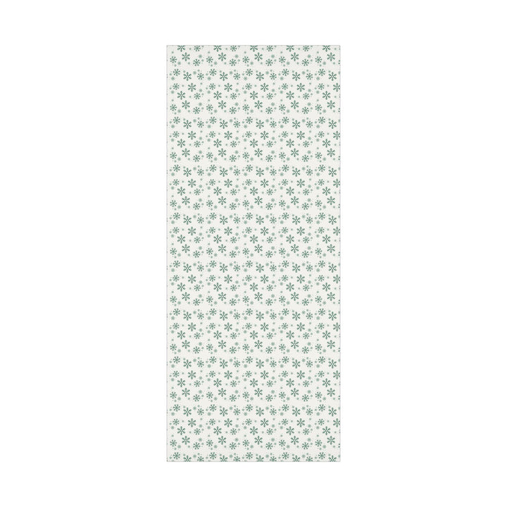 Beautiful simple Green snowflake pattern on a off white background