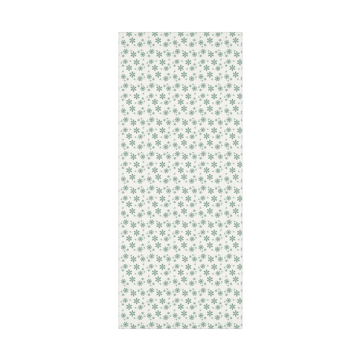 Beautiful simple Green snowflake pattern on a off white background