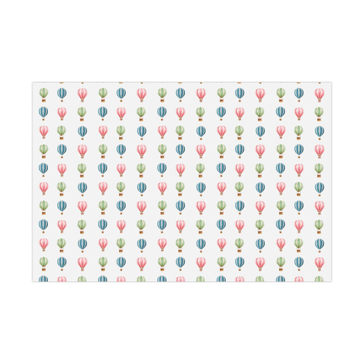 White wrapping paper with cute graphics of hot air balloons in different colors- green blue and pink !
