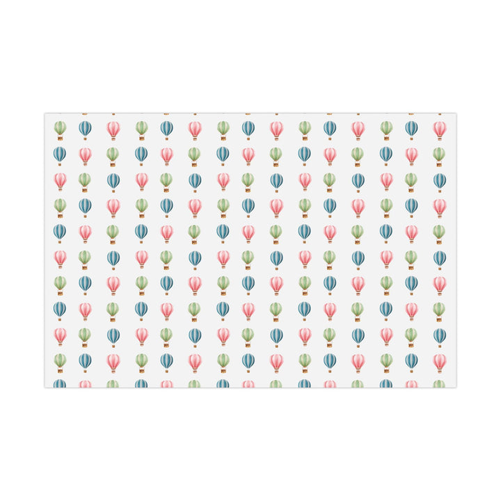 White wrapping paper with cute graphics of hot air balloons in different colors- green blue and pink !