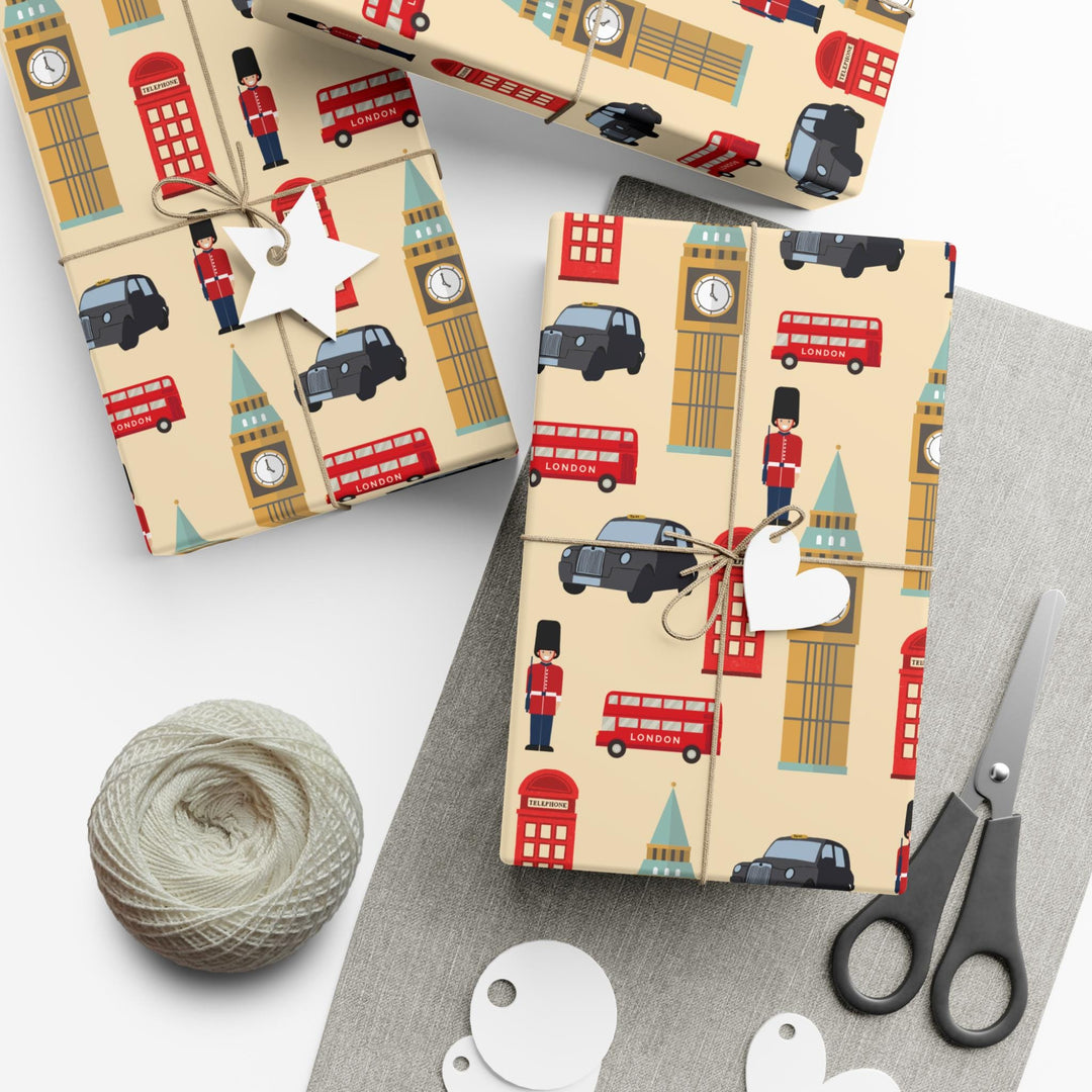 London themed wrapping paper with palace guard, black taxi, Big Ben, telephone booth on tan wrapping paper