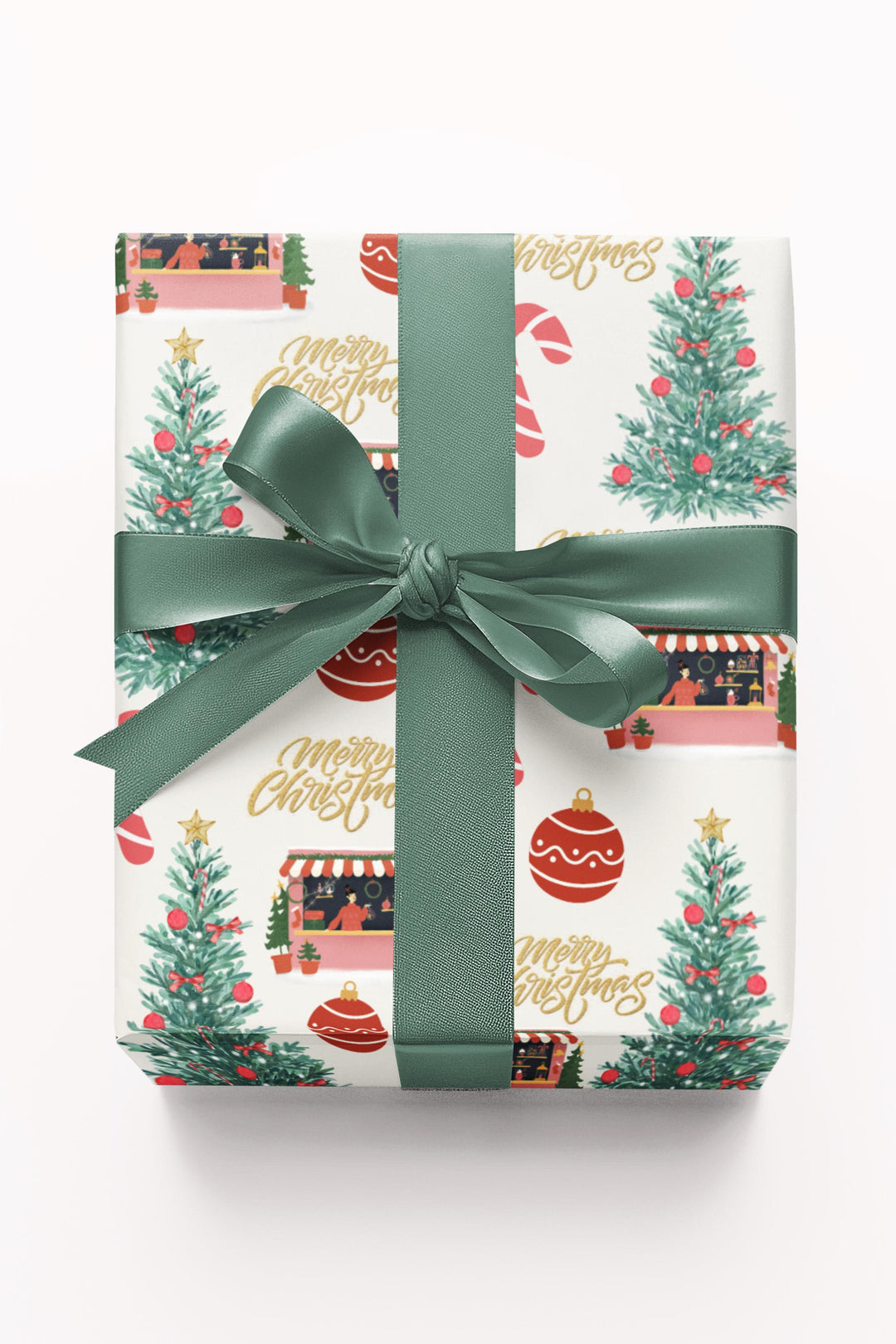 Christmas themed wrapping paper with watercolor graphics of a candy cane, Christmas shop, ornaments and a Christmas tree that has red ornaments. can be printed on a shiny or a matte paper and comes in 3 sizes