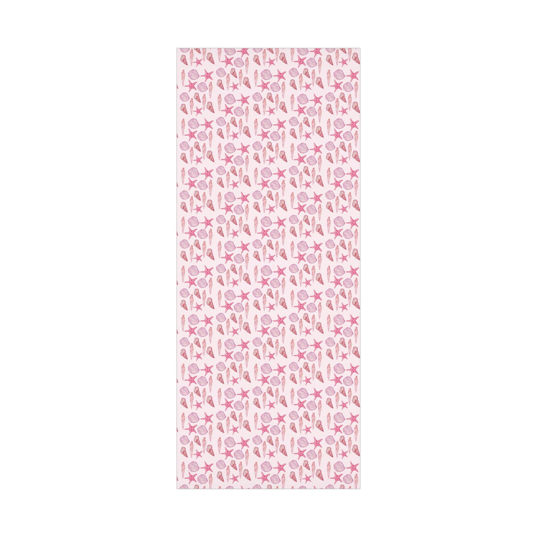 Pink wrapping paper with pink seashell pattern, different seashell shapes in fun bright pink colors