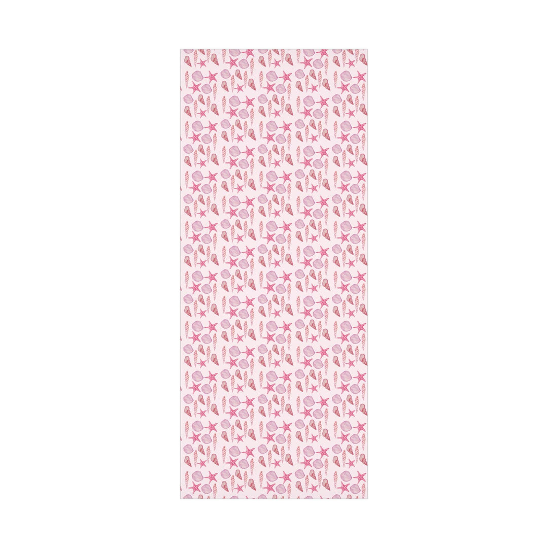 Pink wrapping paper with pink seashell pattern, different seashell shapes in fun bright pink colors