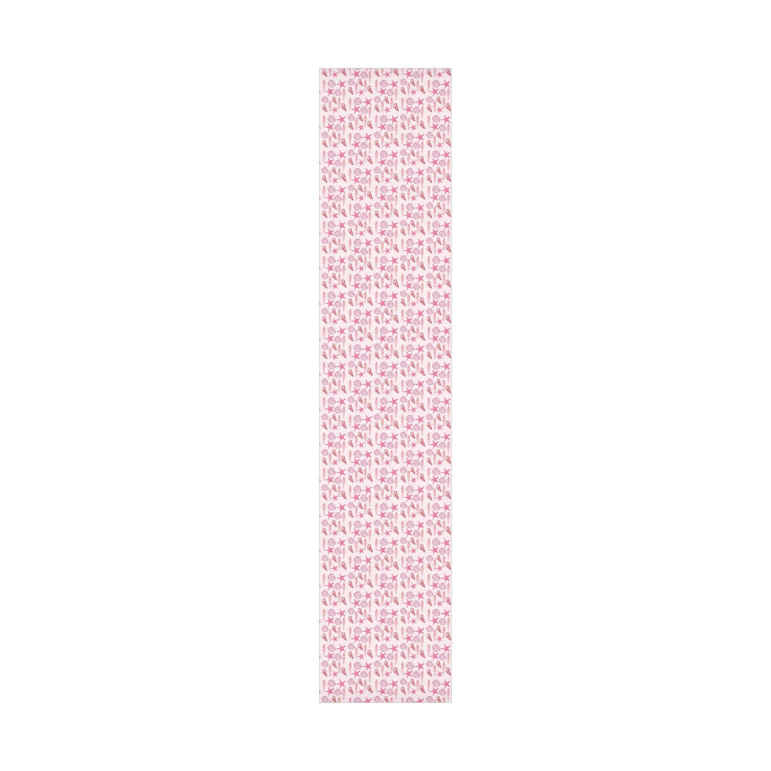 Pink wrapping paper with pink seashell pattern, different seashell shapes in fun bright pink colors