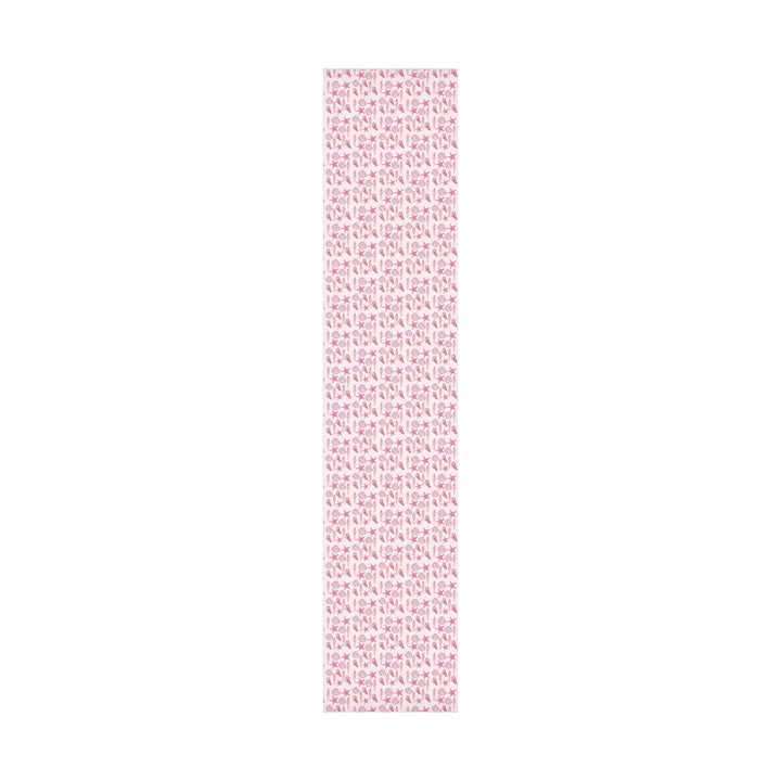 Pink wrapping paper with pink seashell pattern, different seashell shapes in fun bright pink colors