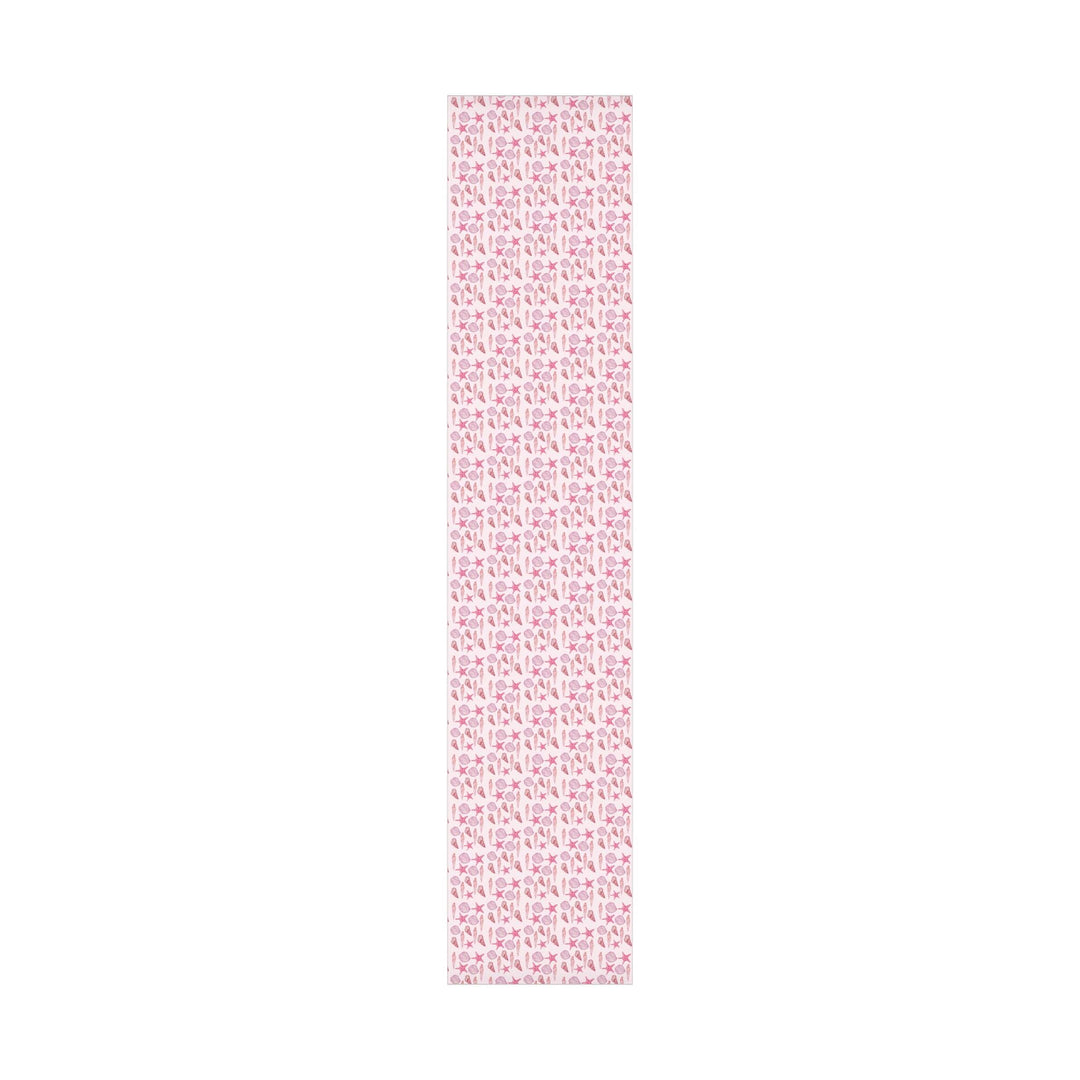 Pink wrapping paper with pink seashell pattern, different seashell shapes in fun bright pink colors