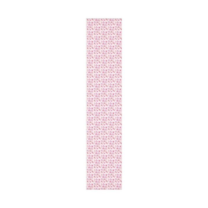 Pink wrapping paper with pink seashell pattern, different seashell shapes in fun bright pink colors