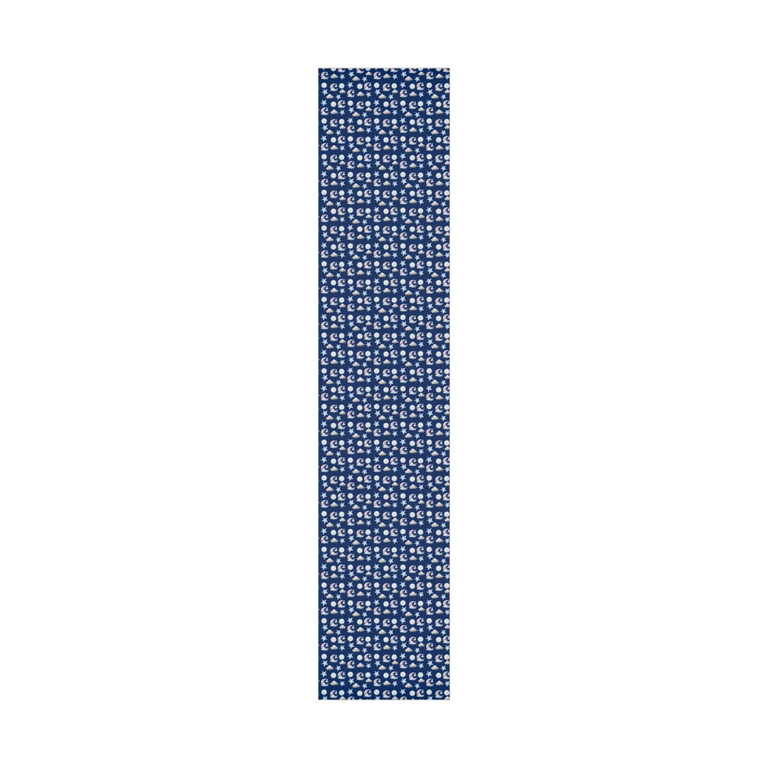 Dark blue wrapping paper with white clouds, white moon and light blue stars graphics, cute for nursery gifts or baby gifts