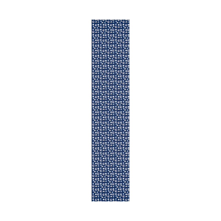 Dark blue wrapping paper with white clouds, white moon and light blue stars graphics, cute for nursery gifts or baby gifts