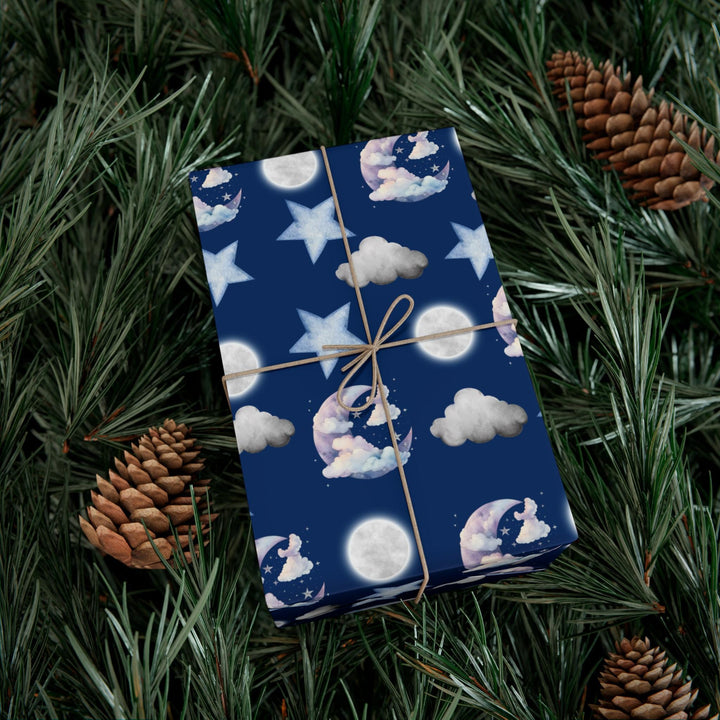 Dark blue wrapping paper with white clouds, white moon and light blue stars graphics, cute for nursery gifts or baby gifts