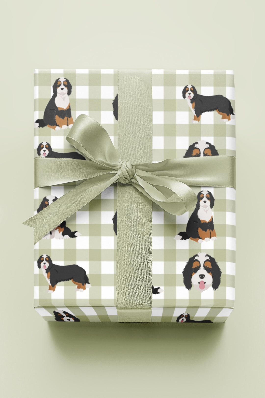 Bernedoodle graphics on light green gingham background wrapping paper