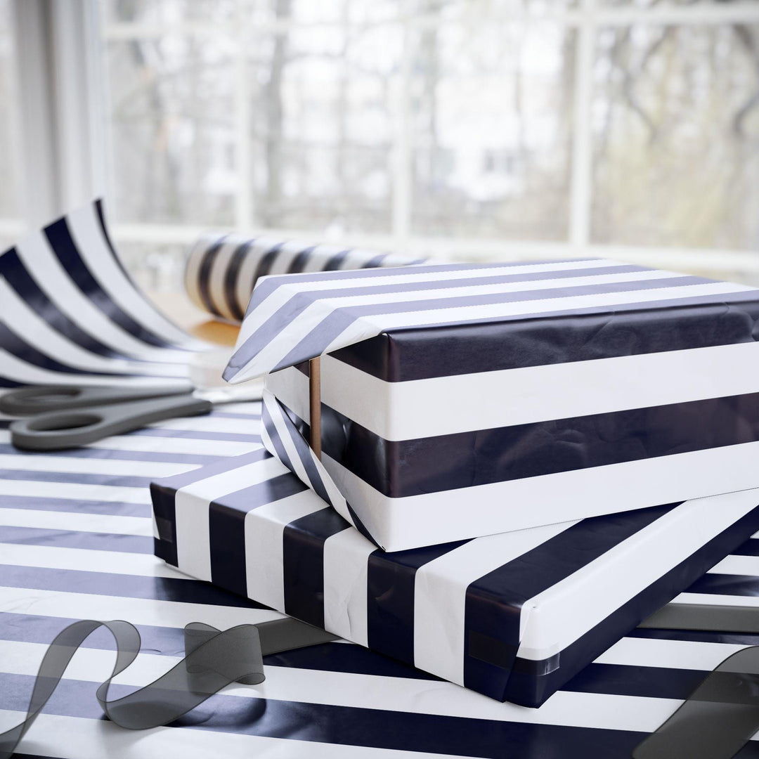 Royal blue striped wrapping paper on white background