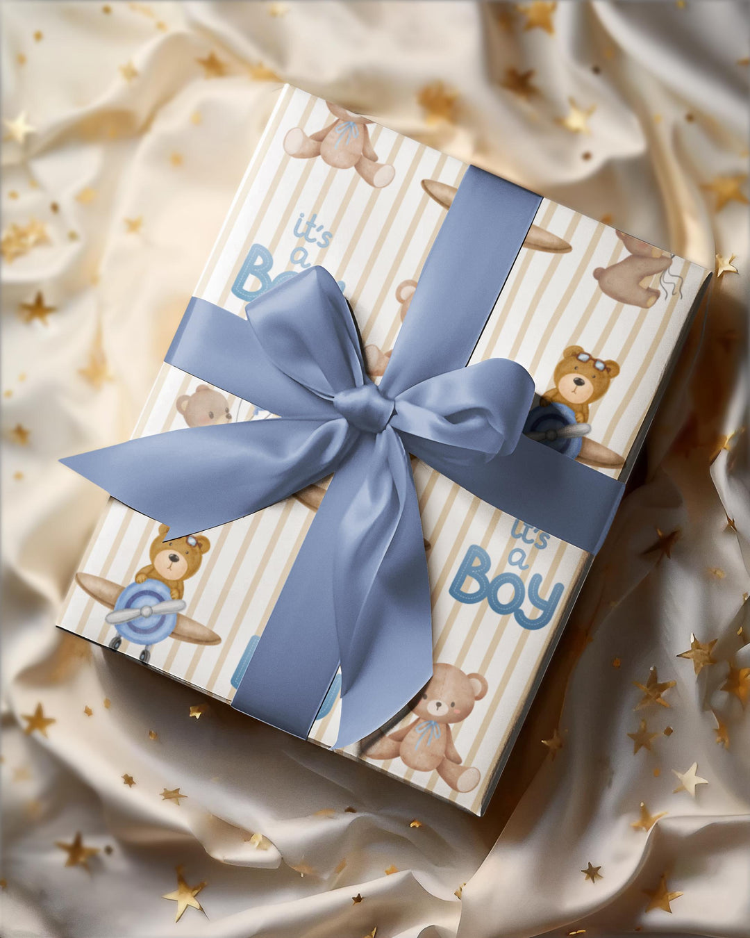 Beige striped wrapping paper with Its a boy text and graphics of little brown bears with blue balloons