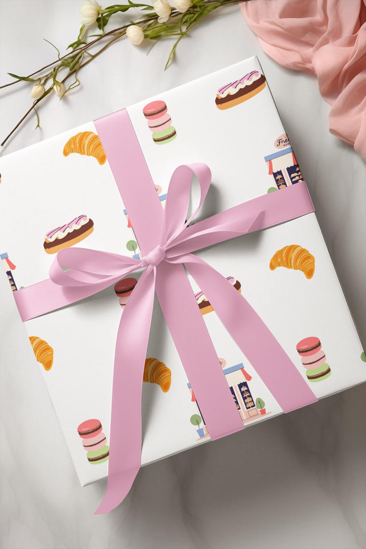 French bakery themed wrapping paper with graphics of macaroons, croissants, French pastries, French bakery - so cute and elegant