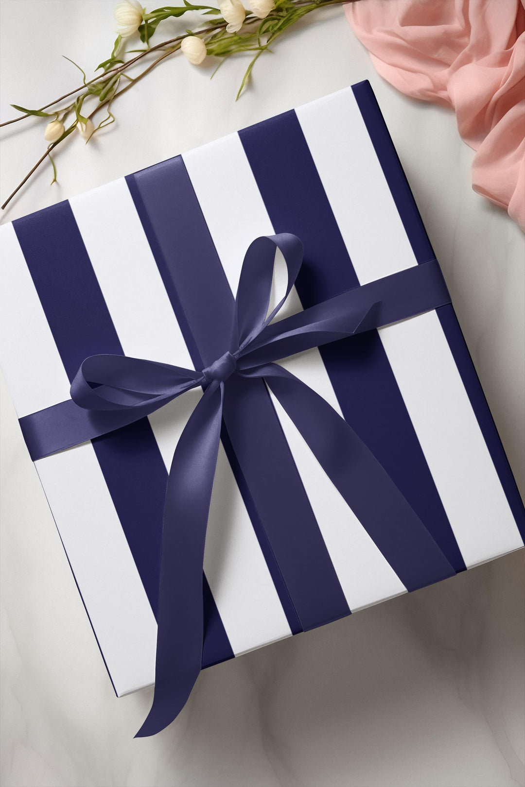 Royal blue striped wrapping paper on white background