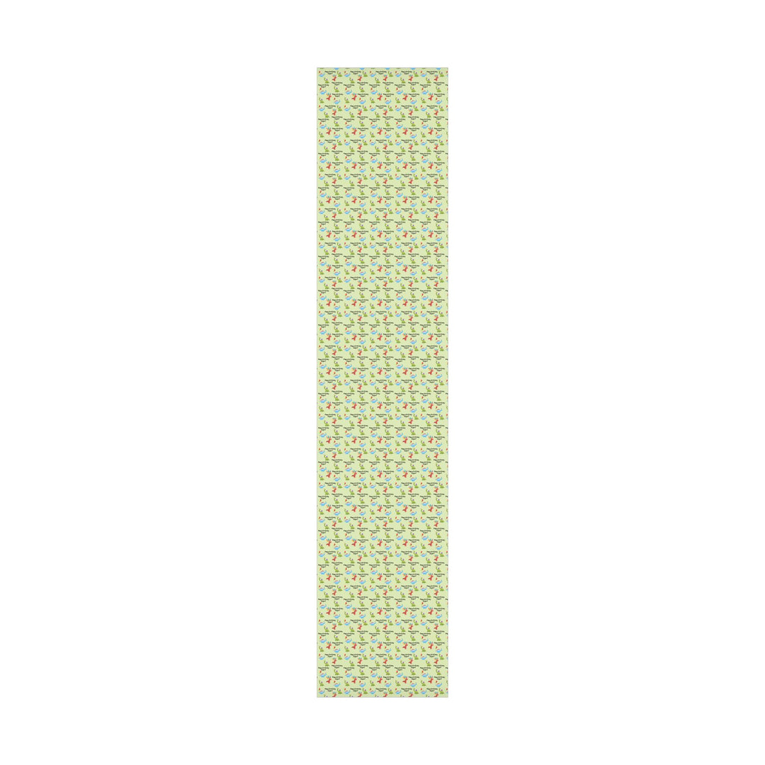 Green wrapping paper with dinosaur fun cute graphics with birthday hats and balloons and personalized happy birthday text