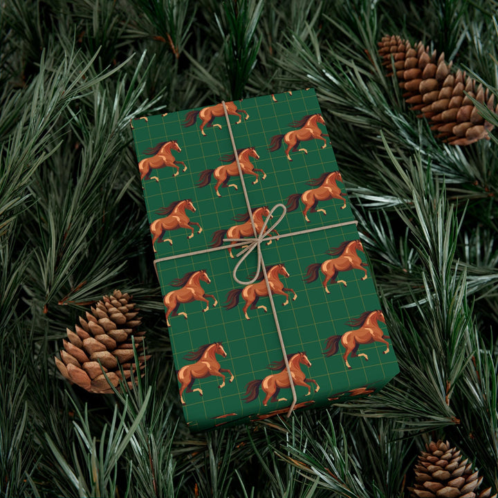 Watercolor graphic of Brown horses in a patterned wrapping paper with a green background with an elegant subtle check pattern