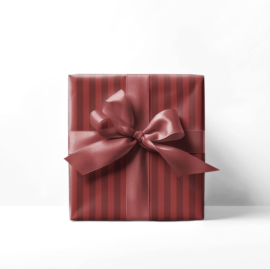 Red stripes on red background wrapping paper for the holidays