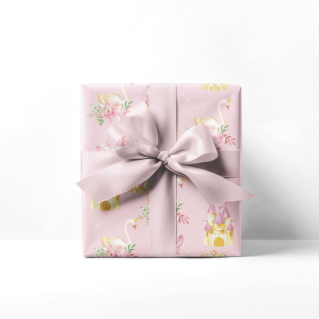 Swan princess themed wrapping paper with graphics of a princess castle, swan princess crown, princess slippers