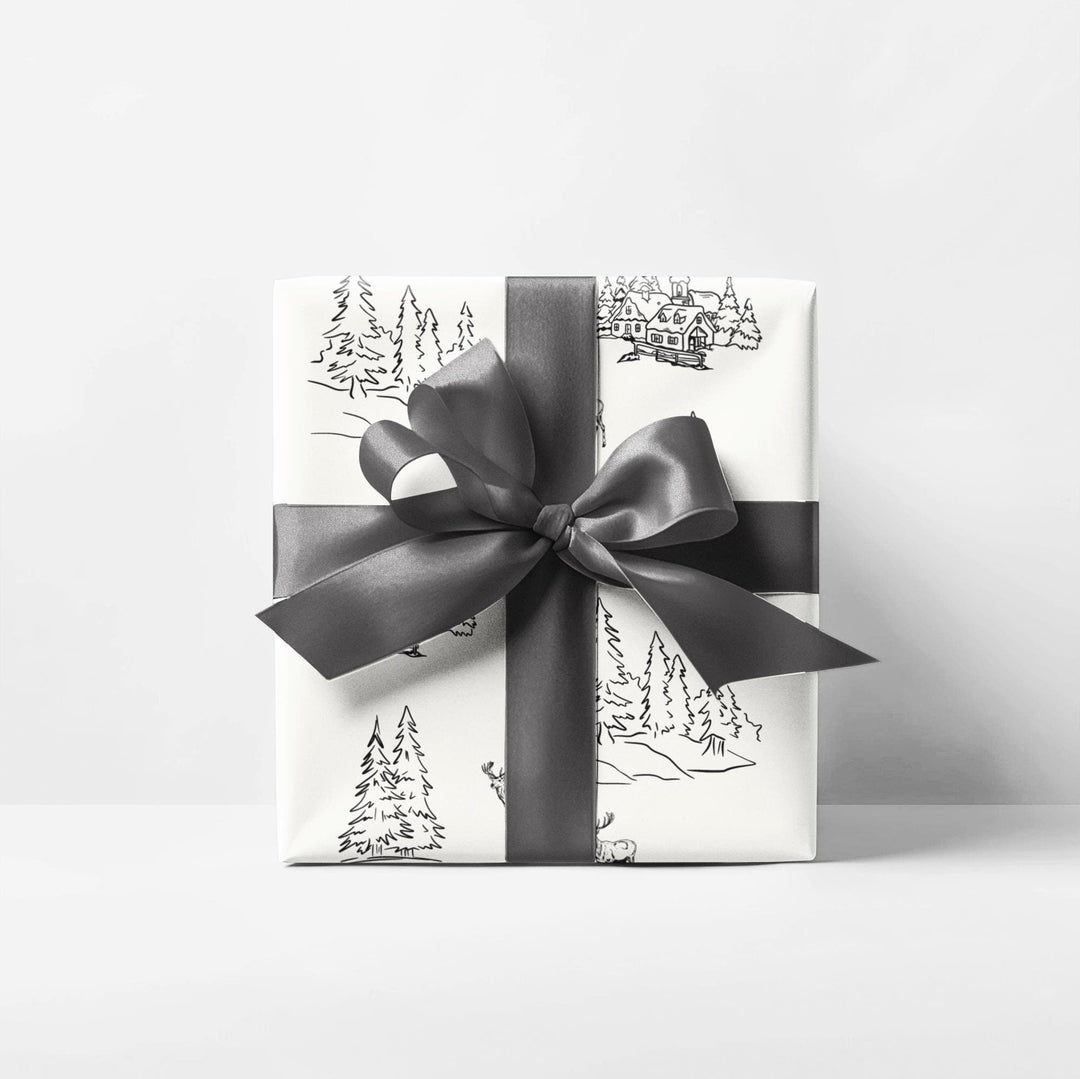 off white background with black silhouettes of christmas trees and  town and christmas log cabin with reindeer graphics- elegant and understated but beautiful and classic