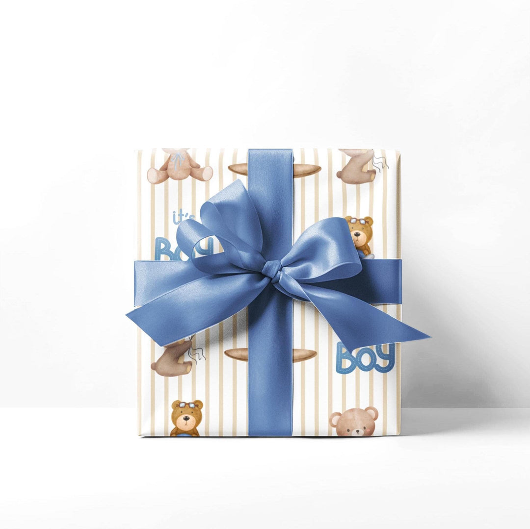 Beige striped wrapping paper with Its a boy text and graphics of little brown bears with blue balloons