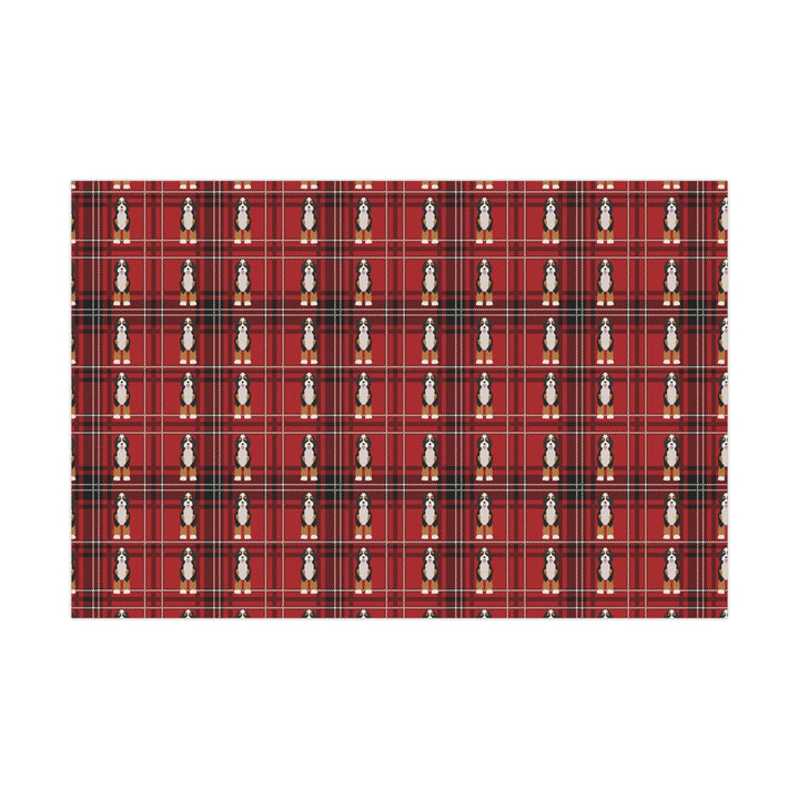 Plaid red and black background with graphics of bernedoodle dogs in a clean pattern wrapping paper