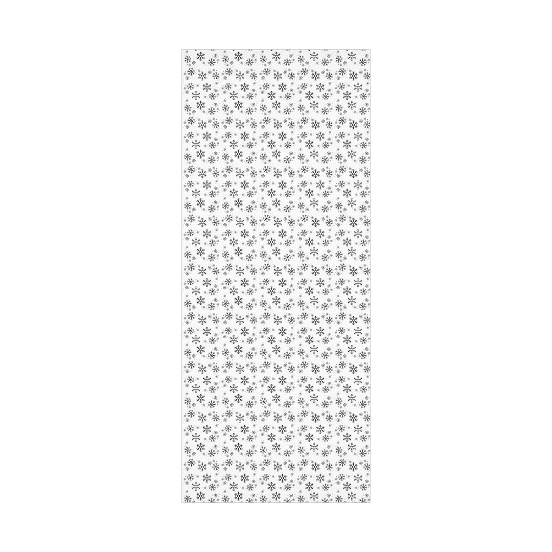 wrapping paper with white background and black snowflakes all over in a subtle but minimal look! beautiful and elegant black and white look!