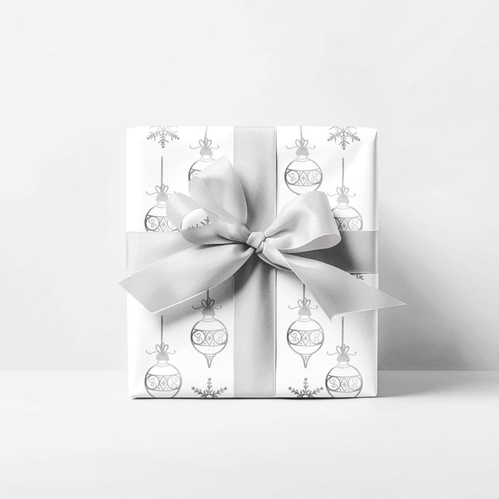 wrapping paper with white background and silver ornaments and silver snowflakes- subtle clean and elegant!