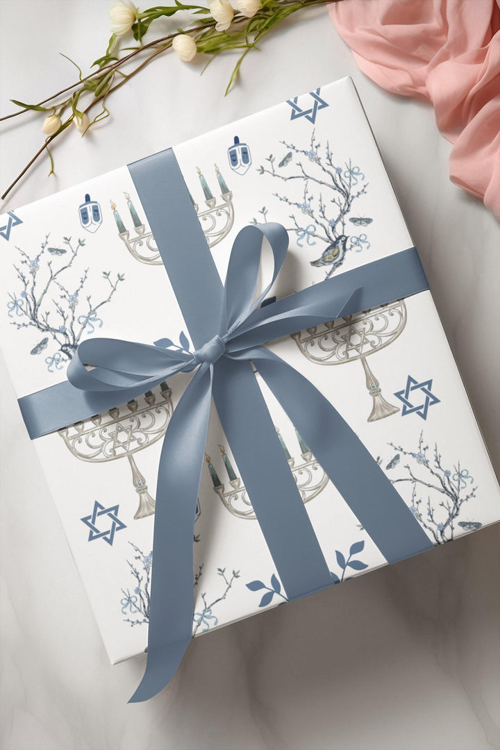 Hanukkah with elegant chinoiserie pattern and menorahs and dreidels and jewish stars on wrapping paper