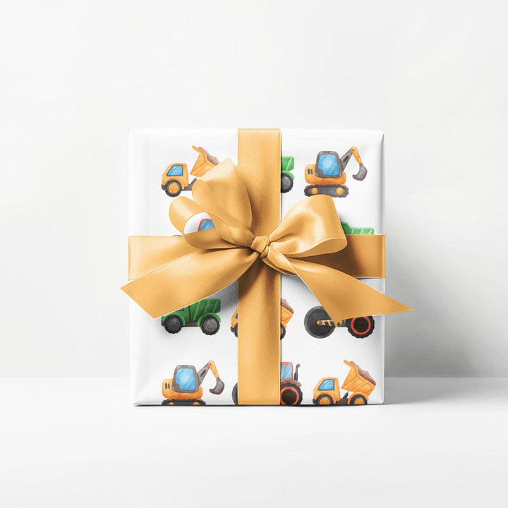 Wrapping paper with white background and cute graphics of construction trucks and vehicles for truck lovers and boys birthday gifts