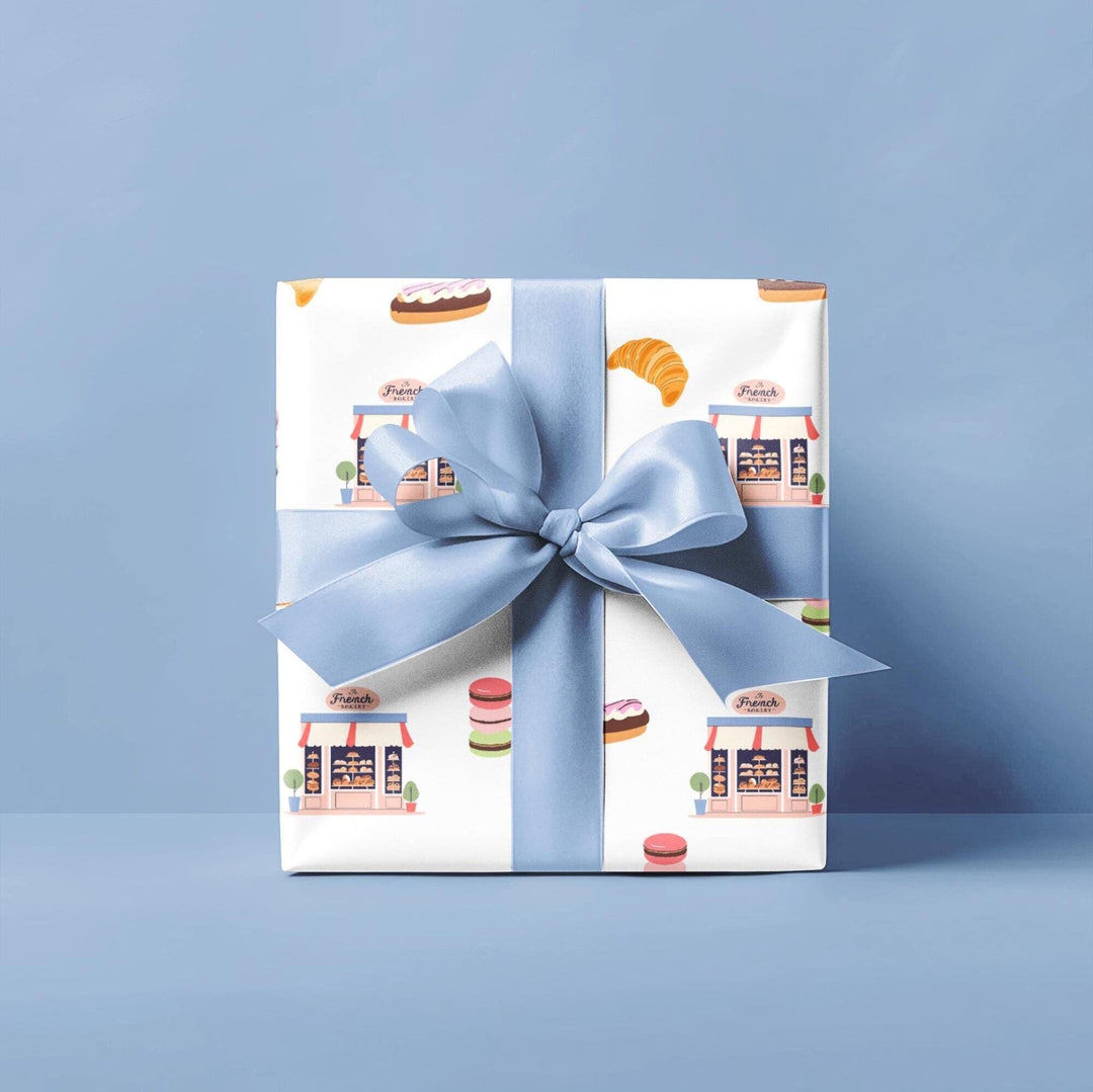 French bakery themed wrapping paper with graphics of macaroons, croissants, French pastries, French bakery - so cute and elegant