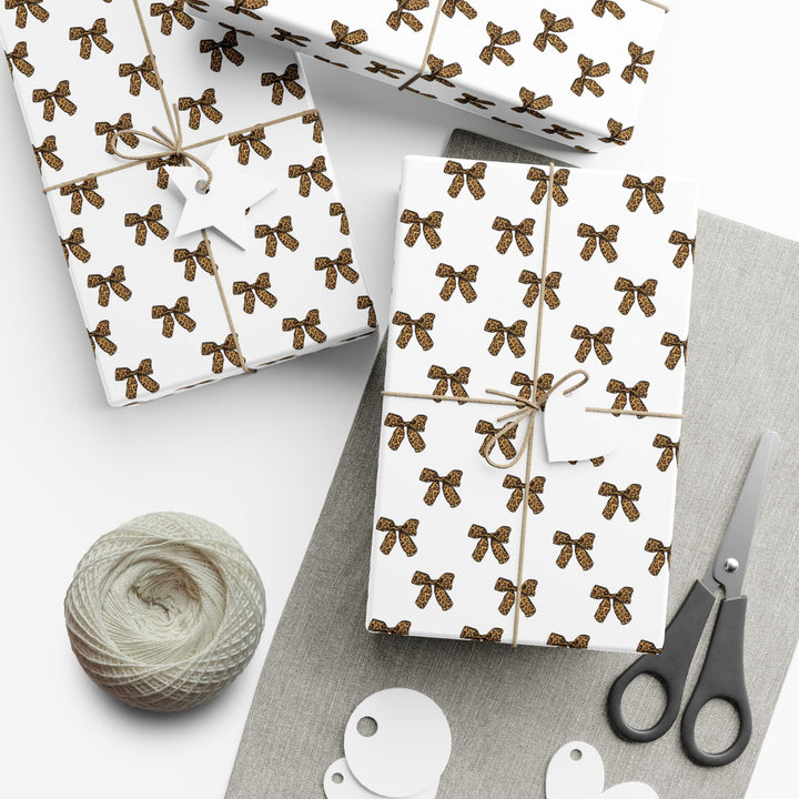 leopard print bow themed wrapping paper with white background