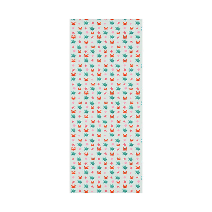 off white background with cute graphics of smiling sea creatures-sea turtle, crab, starfish, pink seashell on wrapping paper!