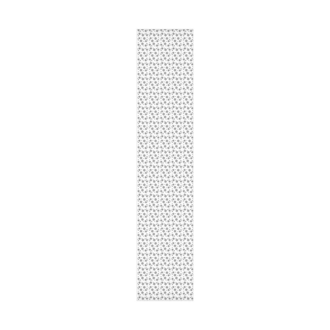 wrapping paper with white background and black snowflakes all over in a subtle but minimal look! beautiful and elegant black and white look!