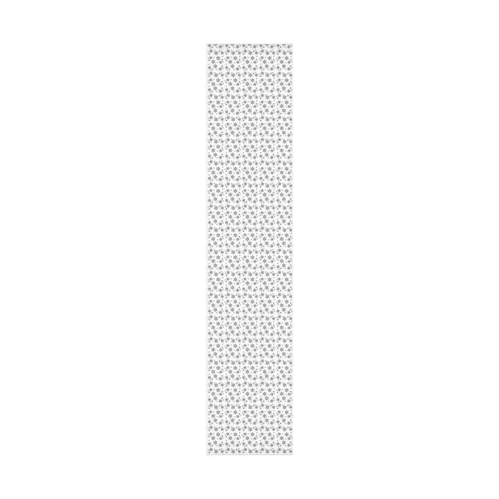 wrapping paper with white background and black snowflakes all over in a subtle but minimal look! beautiful and elegant black and white look!