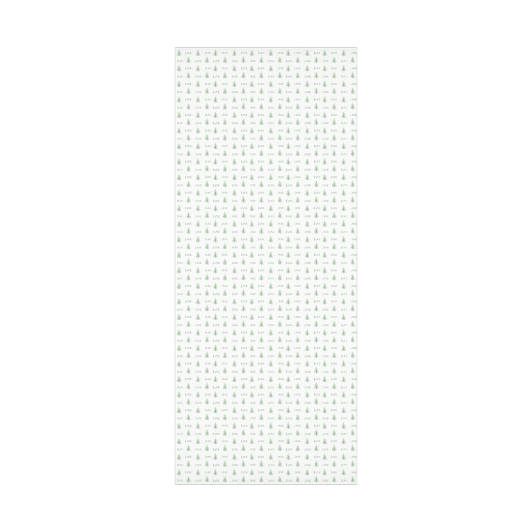 white background with elegant green christmas trees and display font of a personalized name on wrapping paper