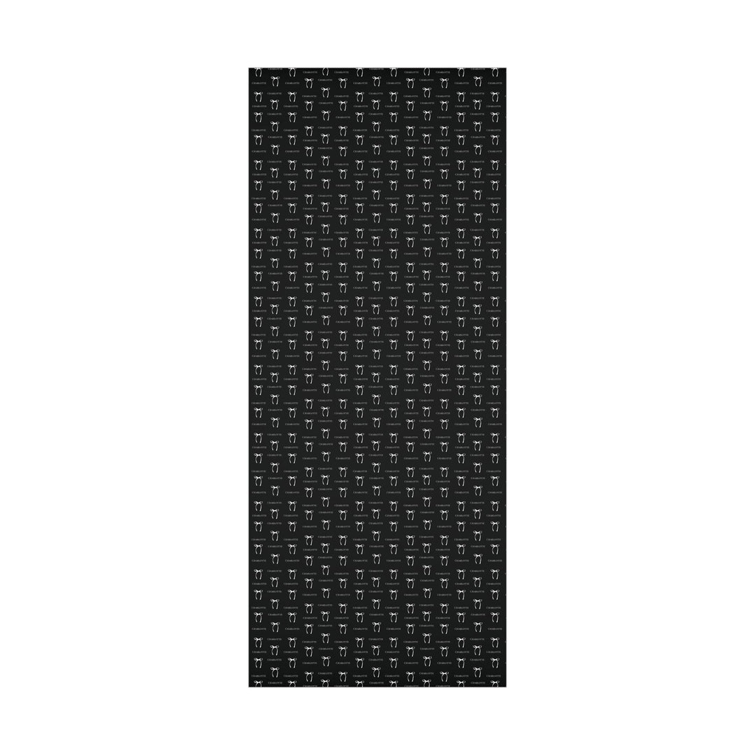 black wrapping paper with white bows and personalized name! chic and trendy gift wrap