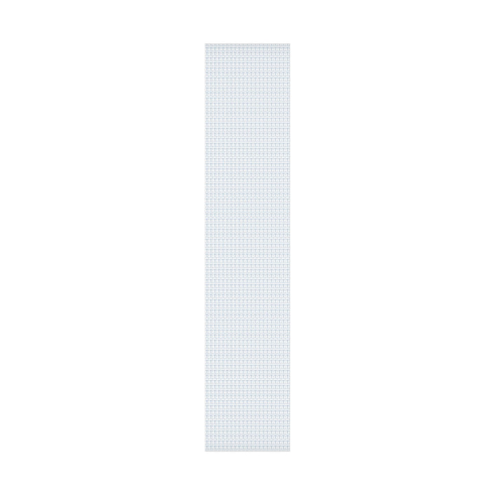 white wrapping paper with blue menorahs and traditional Jewish symbols and personalizable with a name in blue text