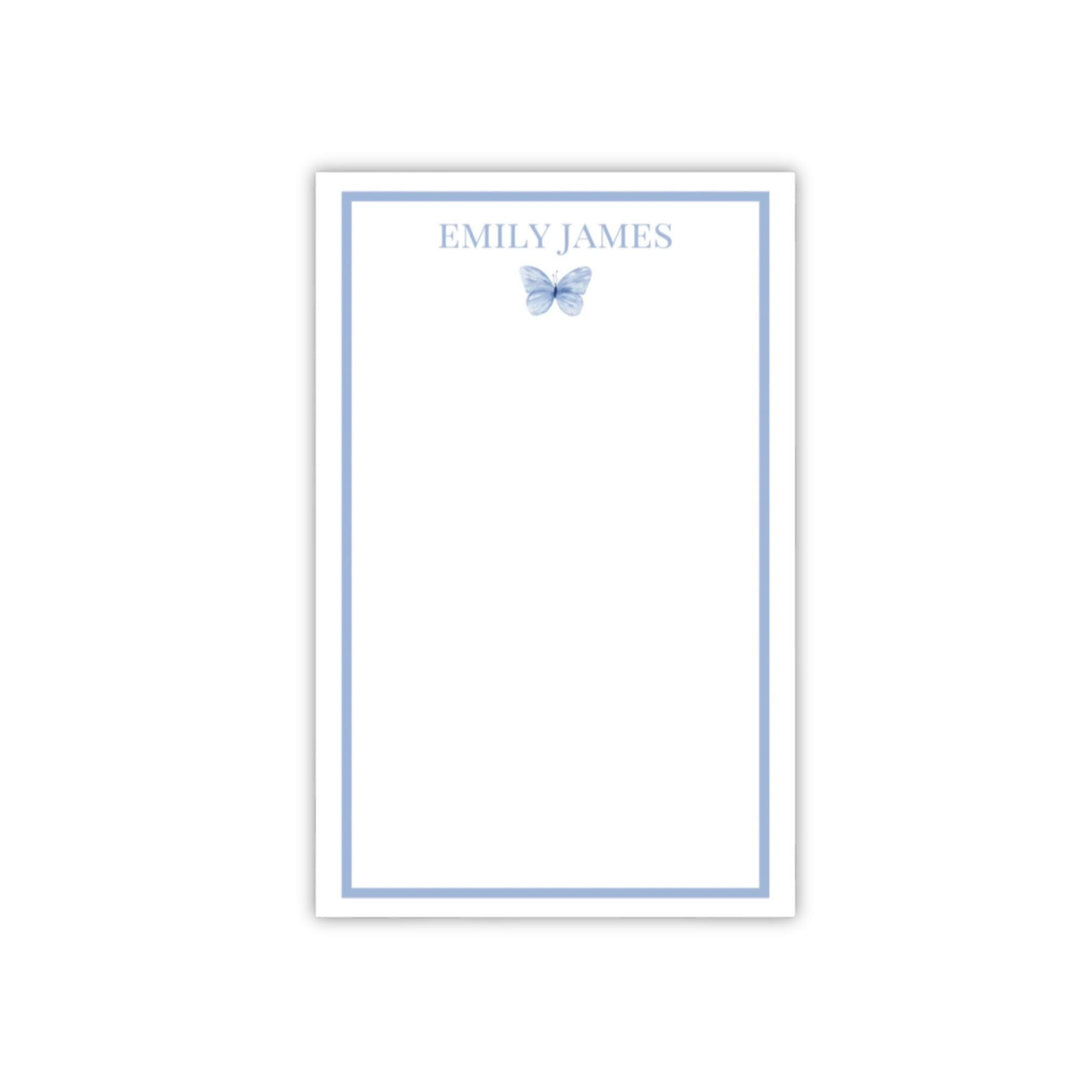 blue butterfly notepad with blue border on white paper with personalized name