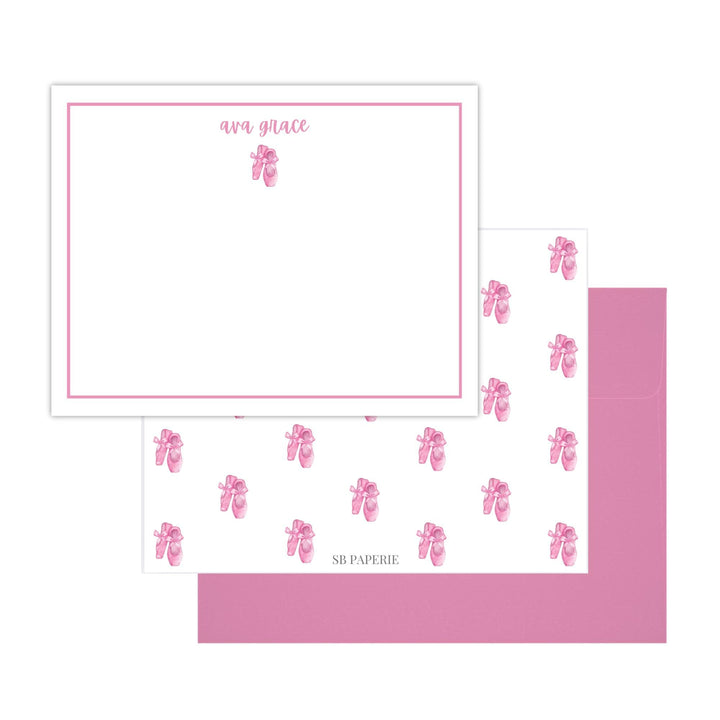 Personalized ballerina stationery set featuring double-sided note cards with a ballet slipper design, pink border, and matching pink envelopes. Perfect for girls’ gifts or thank-you notes.