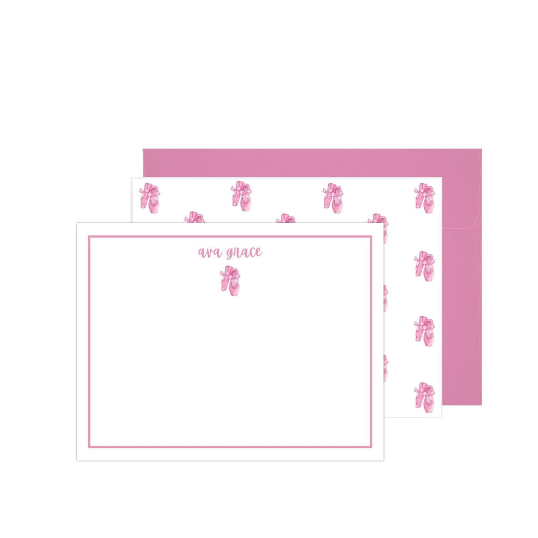 Personalized ballerina stationery set featuring double-sided note cards with a ballet slipper design, pink border, and matching pink envelopes. Perfect for girls’ gifts or thank-you notes.