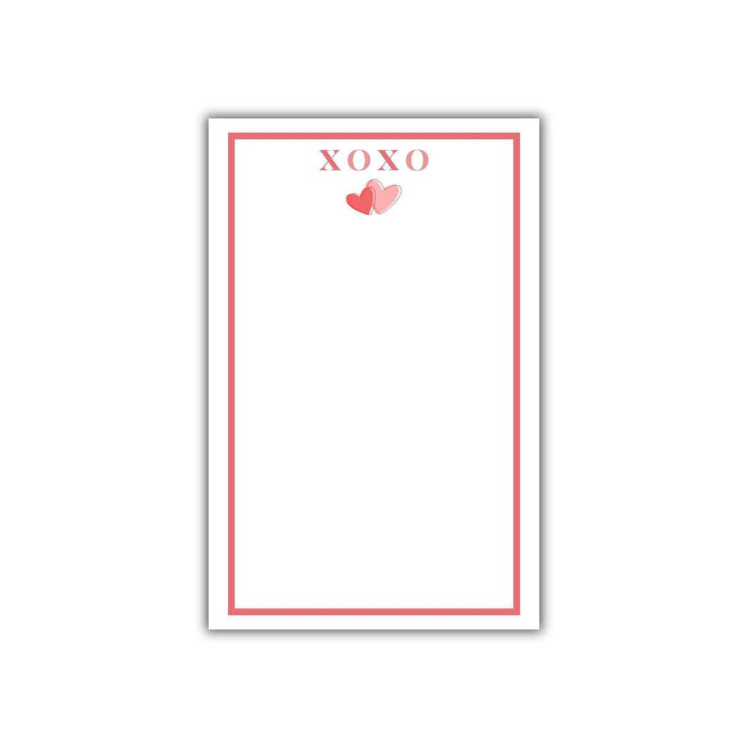 Romantic notepad for Valentine&#39;s Day with red border, pink heart graphic, and customizable name or &#39;XOXO&#39; text.