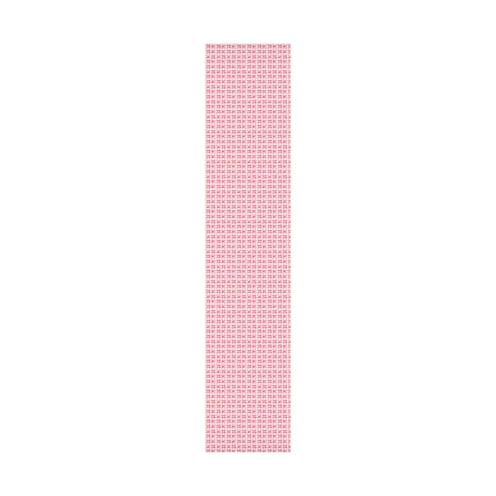 Happy valentines day wrapping paper on pink gingham background with pink hearts